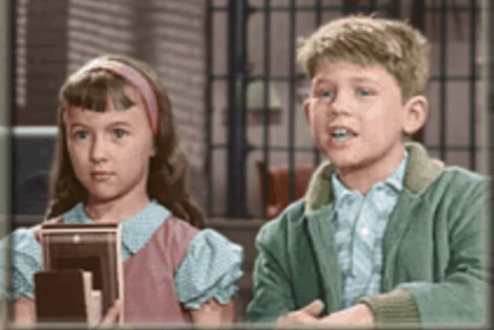 Ronda Jeter as Karen Burgess on The Andy Griffith Show, playing a schoolmate of Opie Taylor